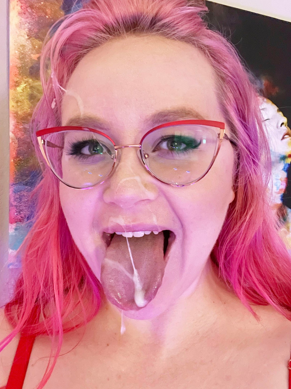 Neon-haired cumslut with glasses.