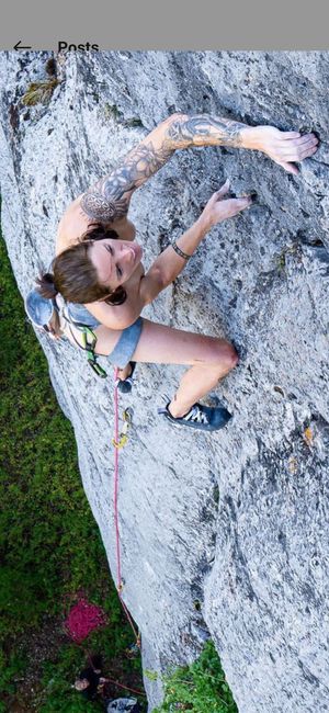 Nudist climbing only wewring a harness