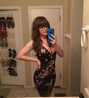 LemonKiwi wearing lowcut dress