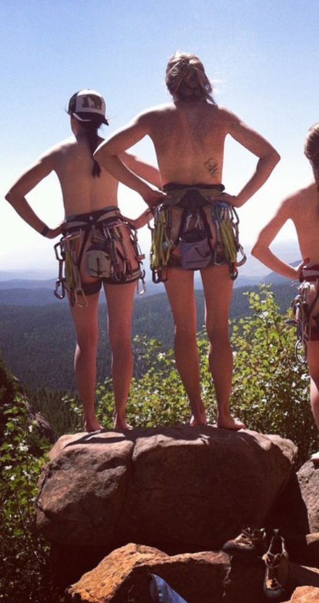 Nude friends climbing