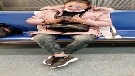 A Romanian Mature without face mask in Subway, disrespectfully woman but sexy.