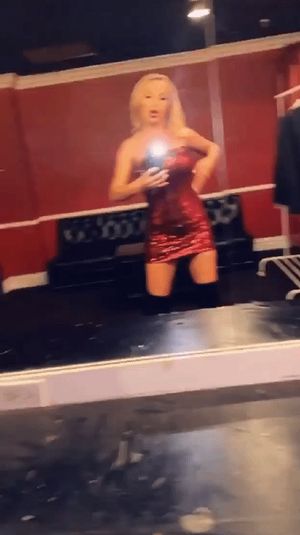 Nikki Benz red mini dress