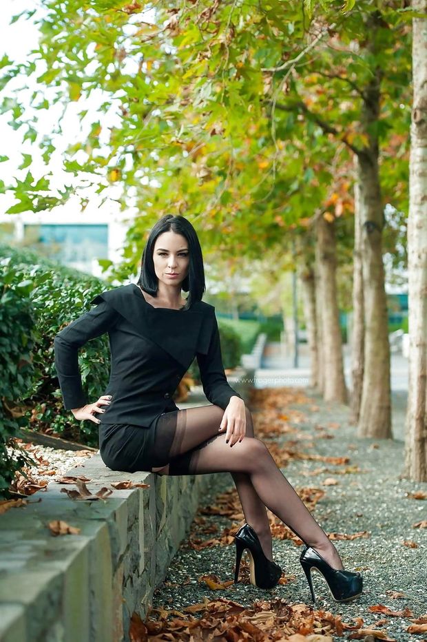 Hot model Nicole posing outdoors in sexy outfit