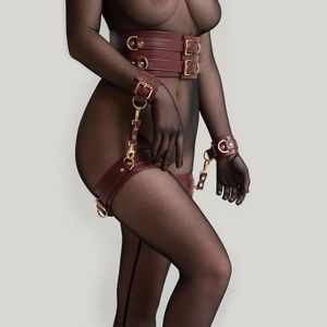 BDSM red leather harness restraints, from TheFPlay's etsy