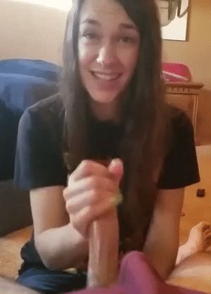 Cute brunette enjoying a handie