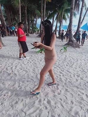 She paraded around like this - with her ass and cunt/vagina showing in front of everyone!