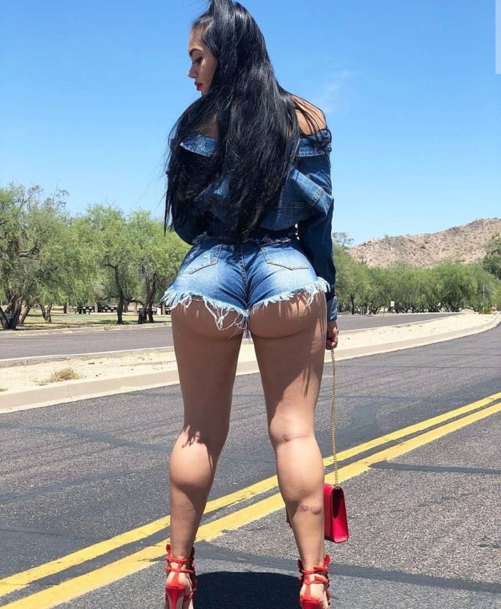 Big booty swallowing denim shorts