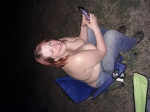 Wife texting a friend to join our camping trip