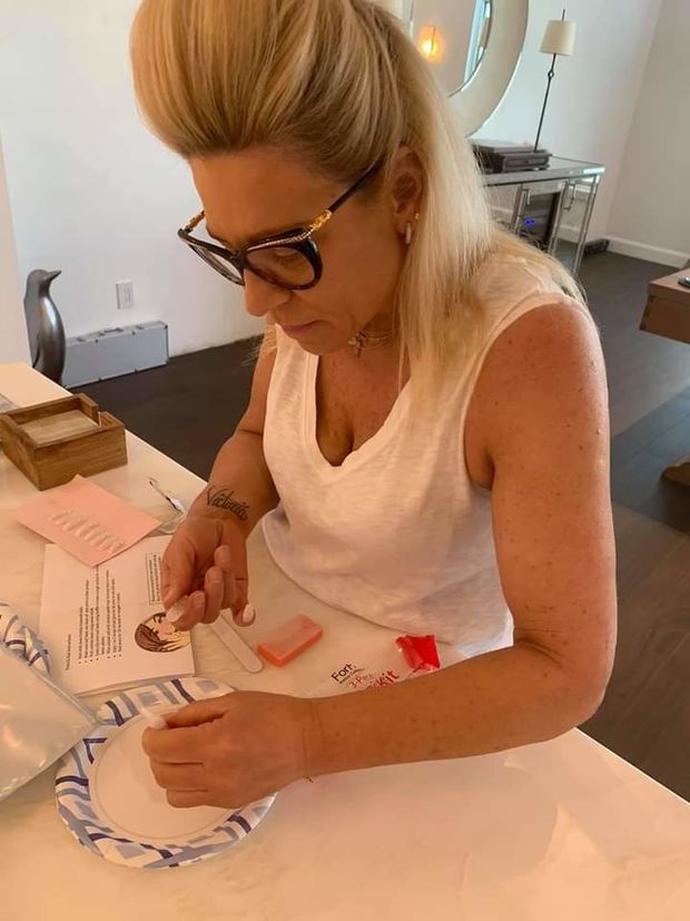 Prepping herself for her signature style.