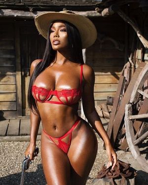 Monifa Jansen dressed as a sexy gunslinger