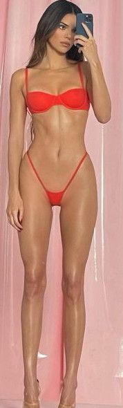Tall sexy model Kendall Jenner flaunting her slender body in tight bikini