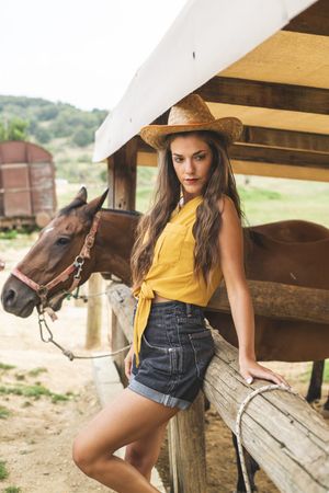 She shows them that she belongs on their turf and becomes their little bucking bronco.