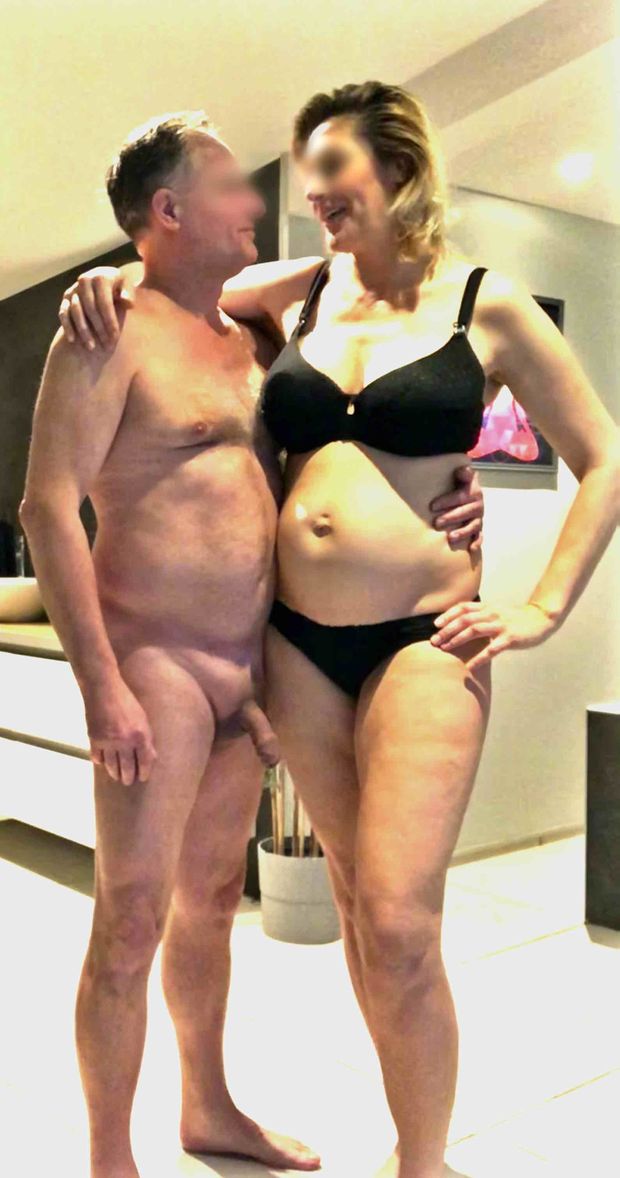 CFNM: my wife took this photo of our beautiful and pregnant neighbor posing with me. Was her first time in only lingerie. So sexy. 114a