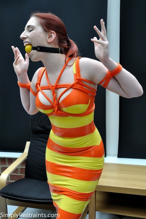 Bound in a rubber dress