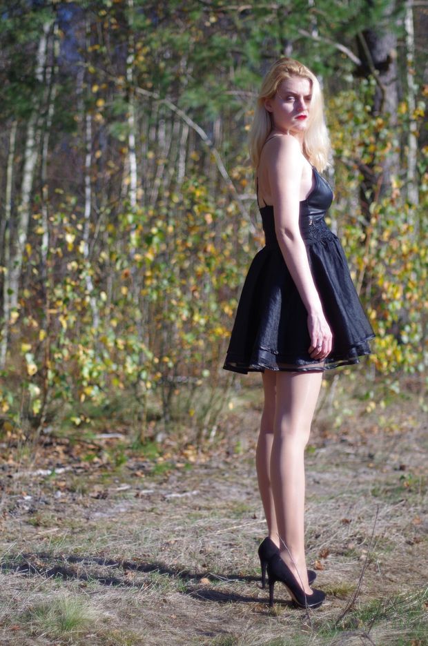 Nice blonde in sexy black outfit