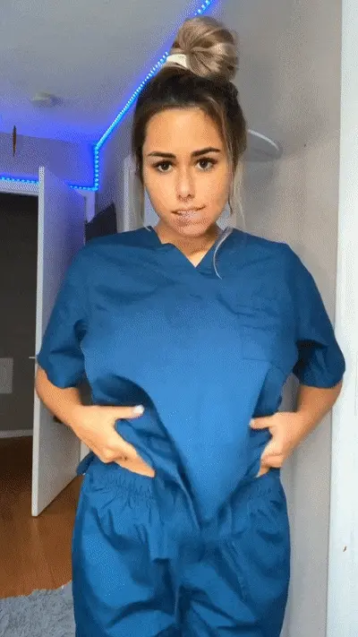 nurse showing awesome tits