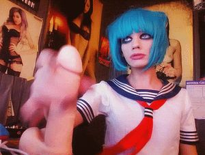 Me stroking my dildo while on webcam in my sailor uniform and blue wig.
