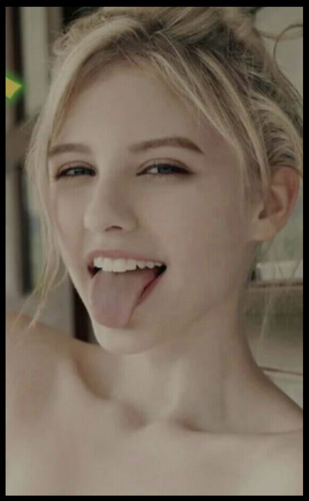 Hot blonde sticking tongue out