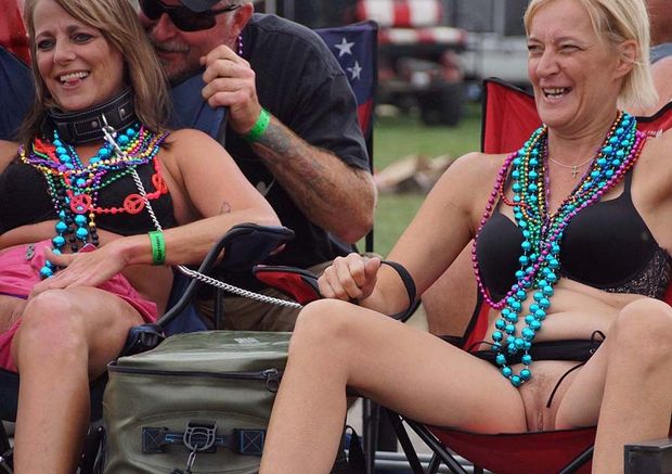 Biker rally chick showing her gash