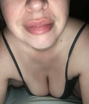 Pouty lips. Big tits.