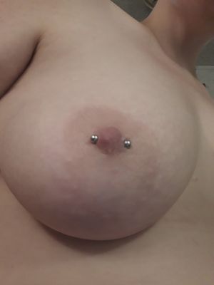 Wife's pierced nipple