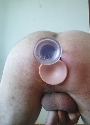 Huge anal gape of a straight guy with two dildos in ass