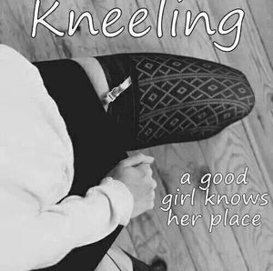 Kneeling, a god woman knows her place