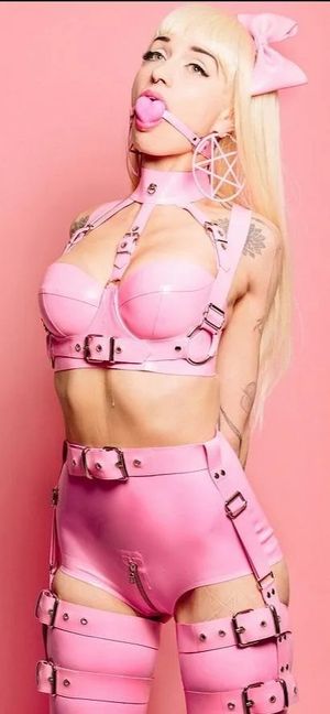 Blonde latex bondage