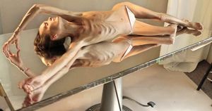 Anorexic slut, Kaiya, learns about her masochistic side.