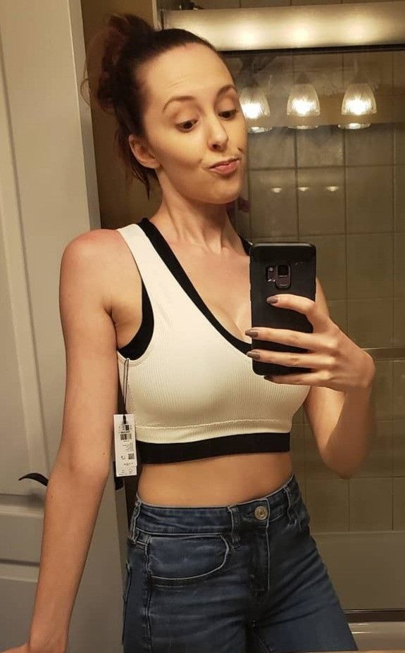 Cutie trying on tops