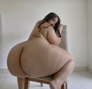 Thick BBW Latina Arched On A Chair