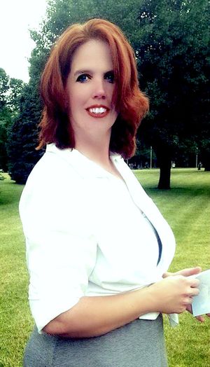 Busty Redhead Milf Tara