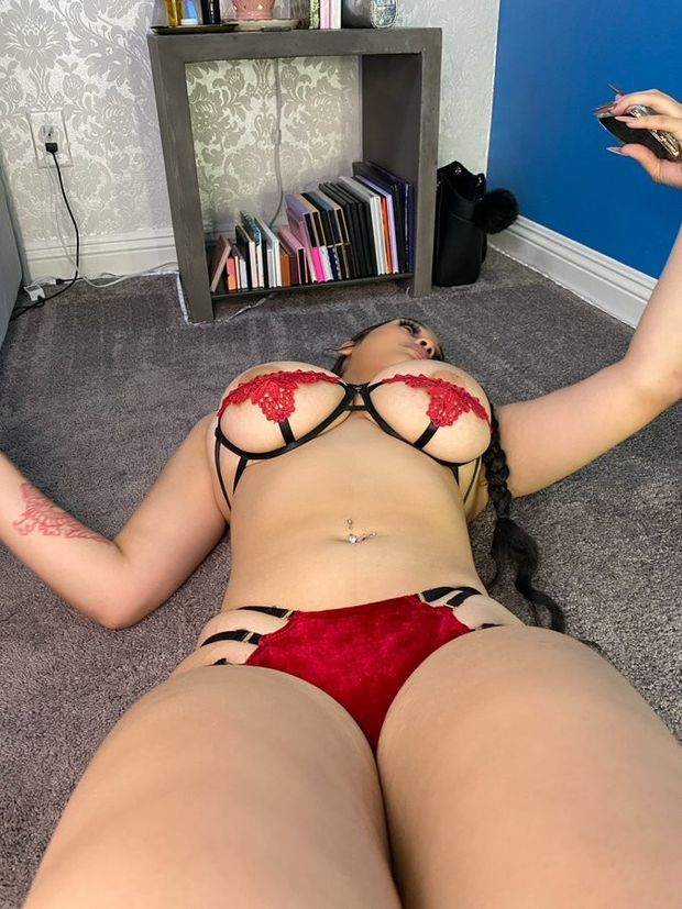 Lexie laying down lingerie