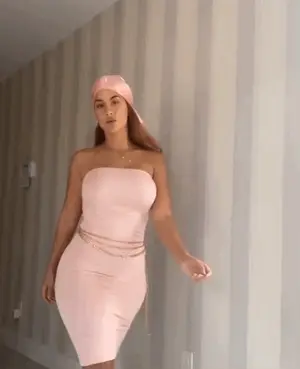 Gorgeous woman in pink dress