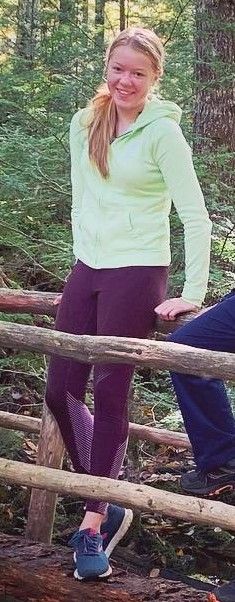 cute teen in leggings outdoors in the woods