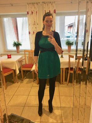 green dress, black stockings