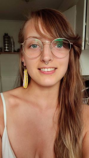 cute slut with nose piercing and big glasses