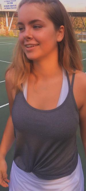 Bella tennis outfit smile