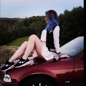 hot bitch posing on car