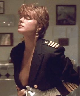 Erika Eleniak showing her ta-tas