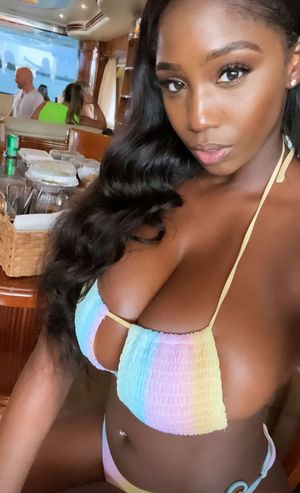 Ellie Mae rainbow bikini in boat