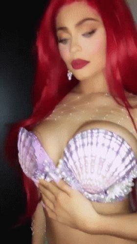 A wild, sexy, busty mermaid appears.