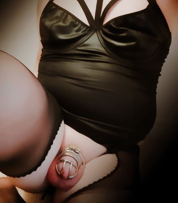 Chubby sissy in chastity and lingerie