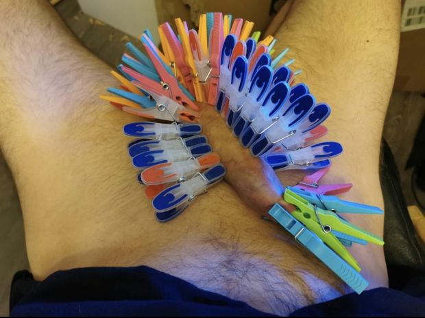 Clothespins on his cock