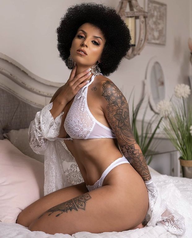 Beautiful ebony woman in white lingerie