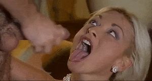 Euro blonde catching cum on tongue