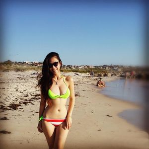 Hot Asian chick Jess in tight green bikini top