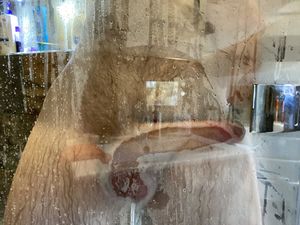 Pressed against the glass