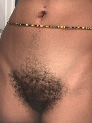 Curly pussy pubes with a treasure trail