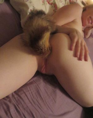 Sexy nude wife with buttplug tail.